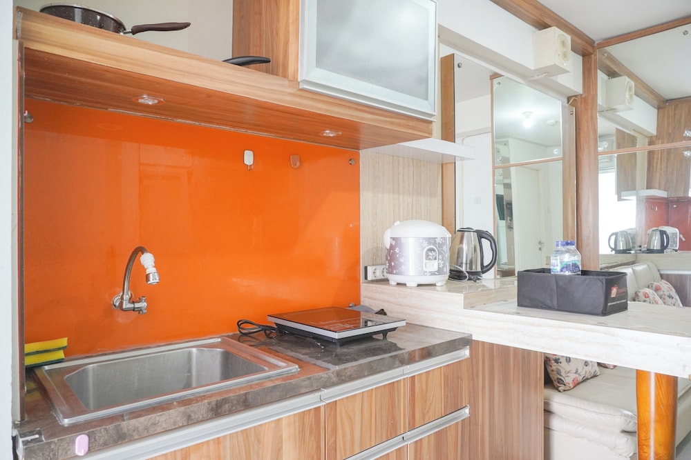 Homey And Strategic 2Br At Bassura City Apartment