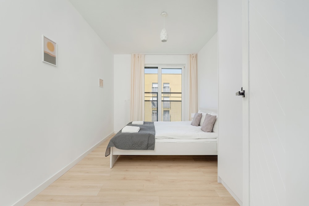 Wroclaw Dark Blue Apartment by Renters