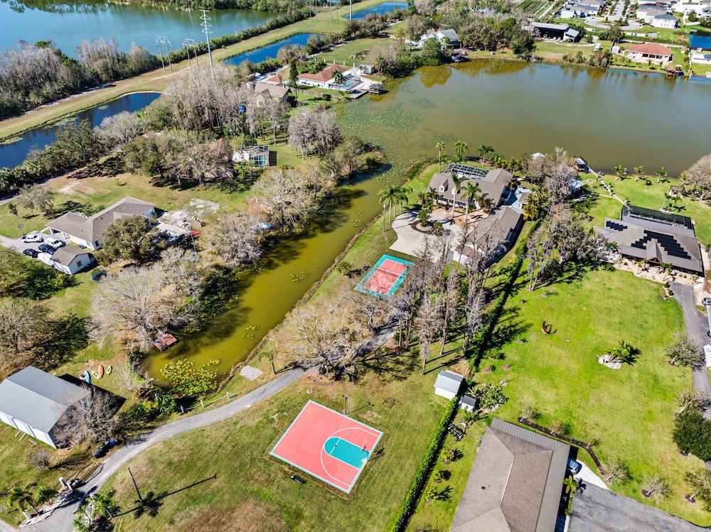 Luxe Waterfront Hideaway w Pool & Pirate Ship Dock