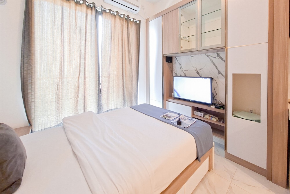 Modern Earth Tone Minimalist Studio At Sky House Bsd Apartment