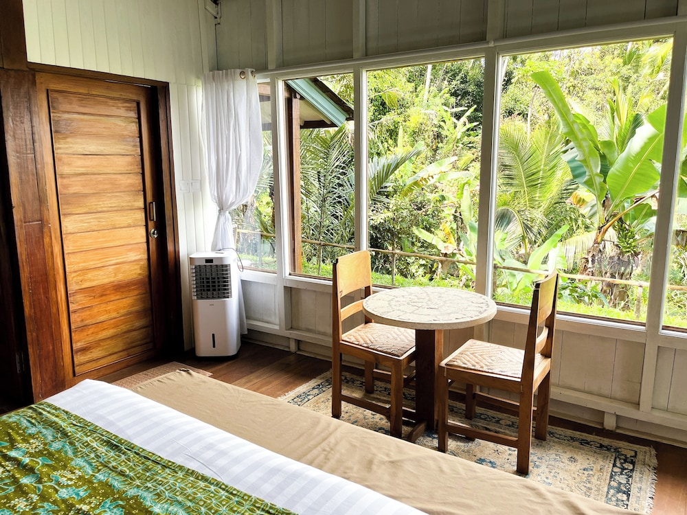 Frame Cabin with Endless Rice Field View