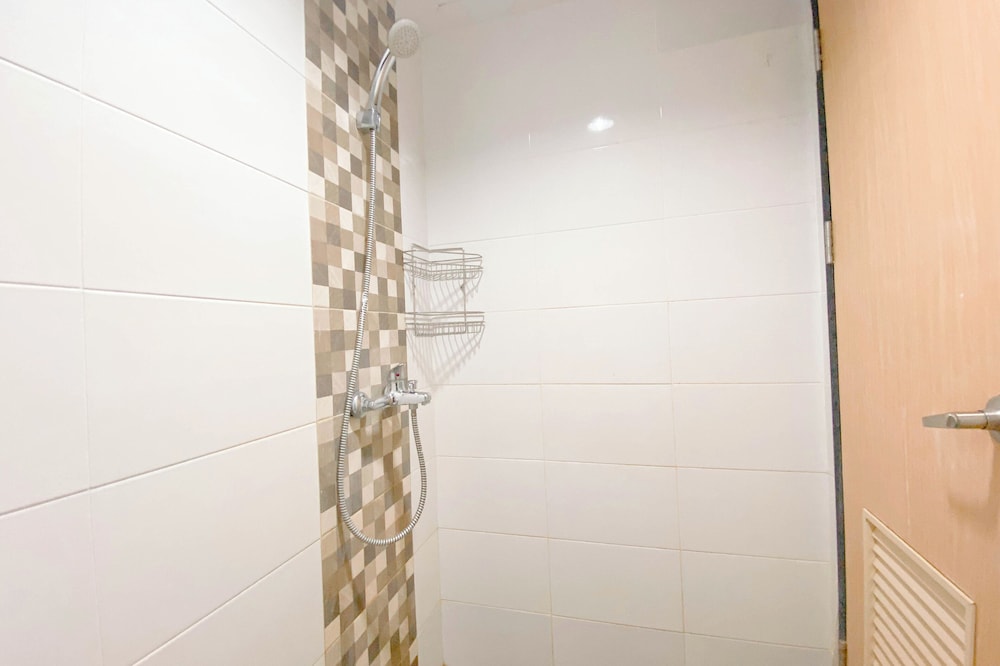 Simple White Studio Apartment At The Alton Semarang