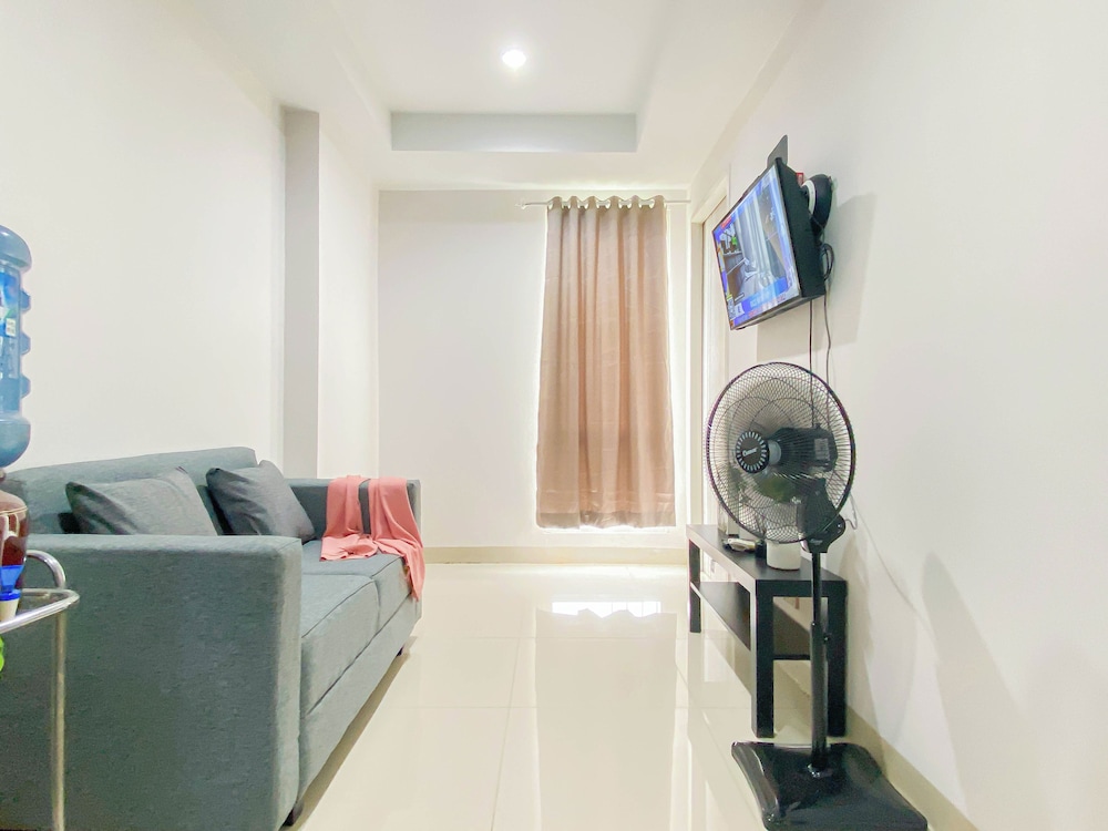 Simple 2Br At Azalea Suites Apartment