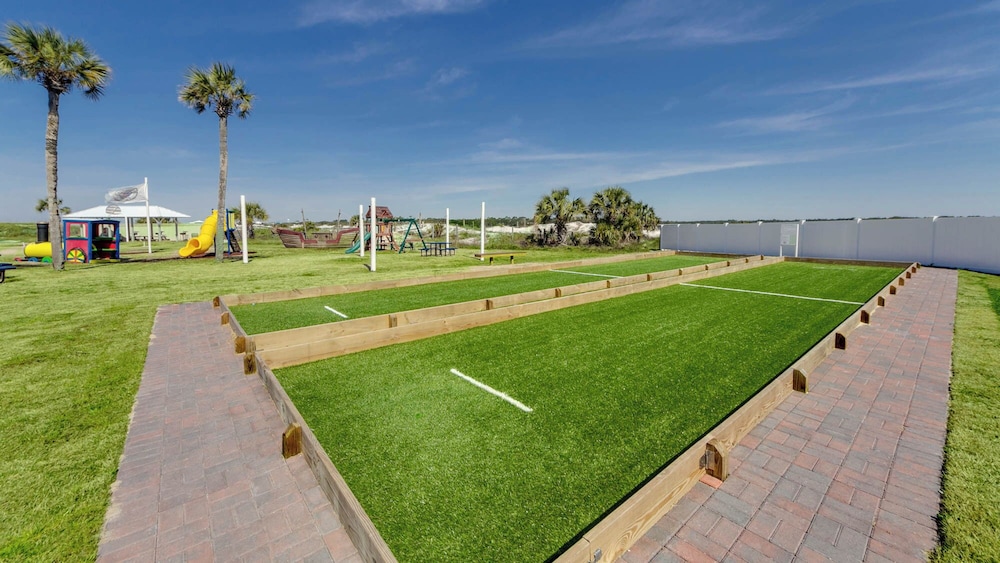Beachfront Charm Meets Lake Life + Free Tickets: Dolphin Cruise & More!