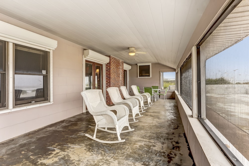 Charming Oceanfront Beach House by RedAwning