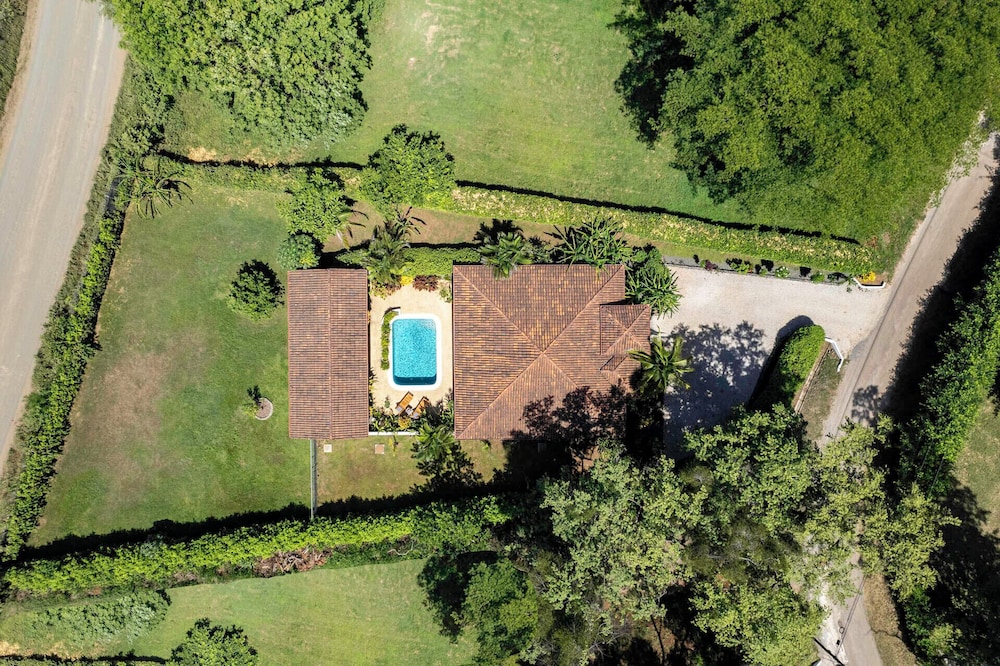 Stylish Home with Chic Decor, Luxury Amenities & Tropical Outdoor Oasis with Sparkling Private Pool