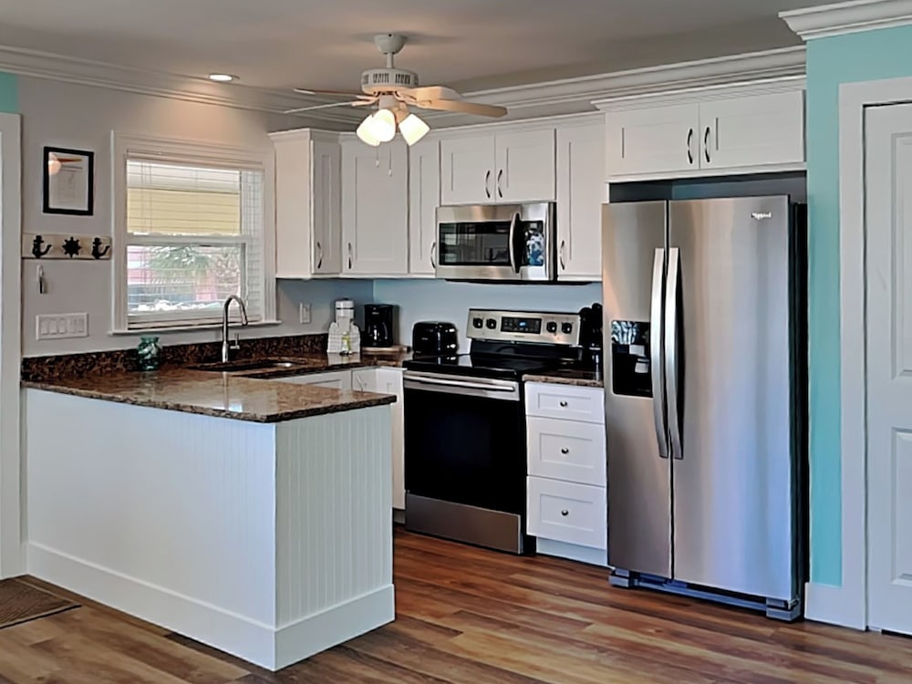 The Tides Retreat by Distinctive Beach Rentals