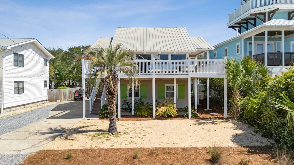 Beach Retreat w/ Sundeck, Golf Cart & Bikes Bungalow House by Avantstay
