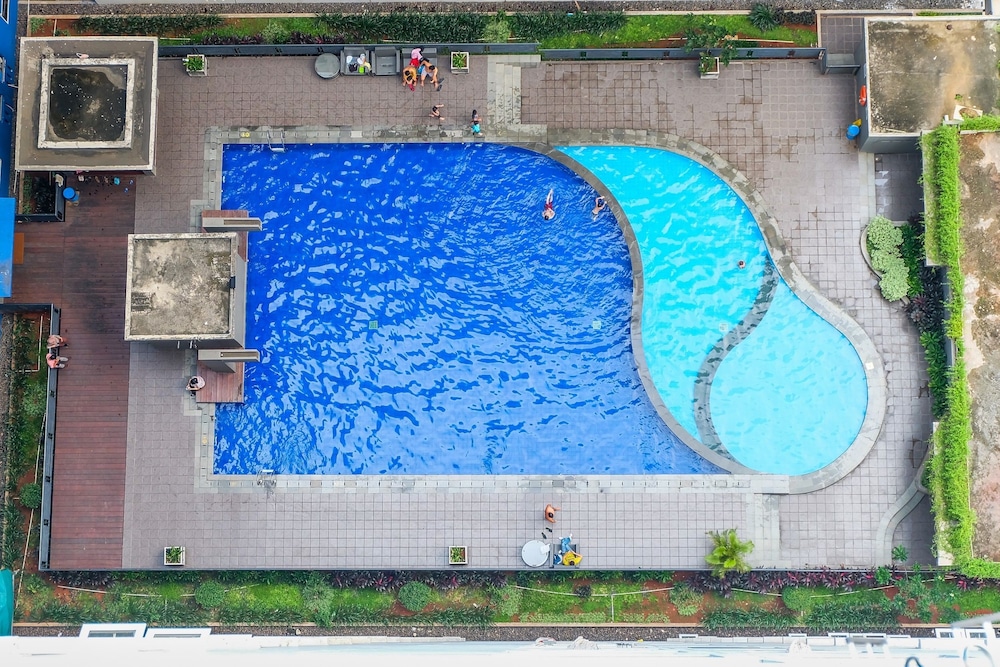 Minimalist Studio Green Pramuka Apartment view 5
