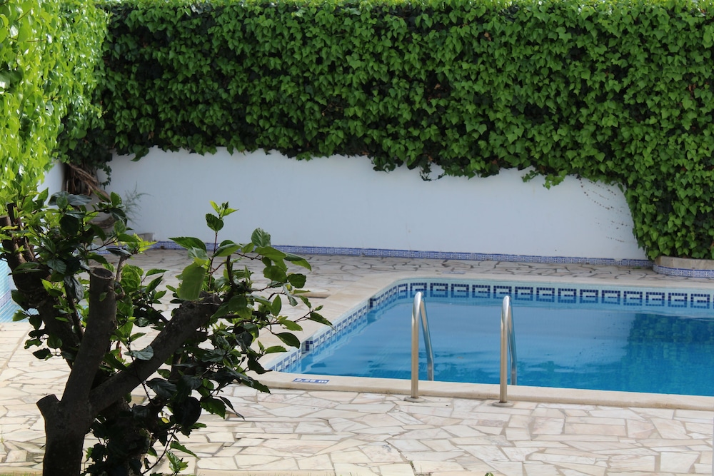 Cheerfulway Oura Village Garden Apartamentos