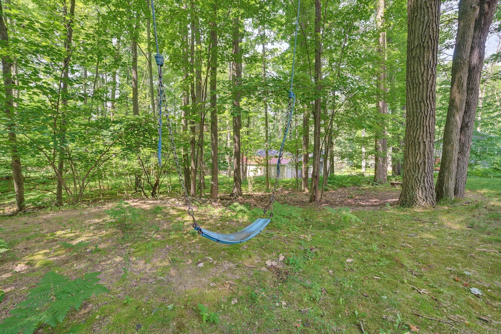 Dock Access + Nearby Beach: Higgins Lake Retreat!