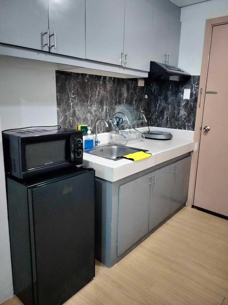 Cozy City View Condo in Quezon City - Your Home Away From Home
