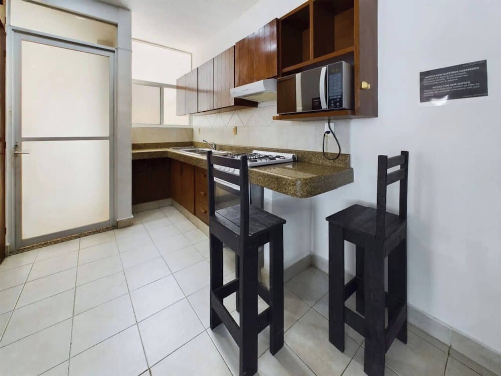 Stylish 2BR Retreat With Private Patio
