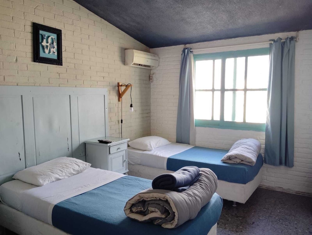 Pastora Suites & Hostel