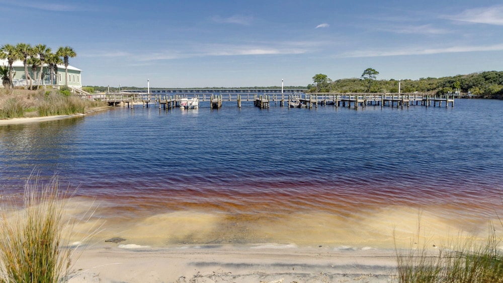 Beachfront Charm Meets Lake Life + Free Tickets: Dolphin Cruise & More!