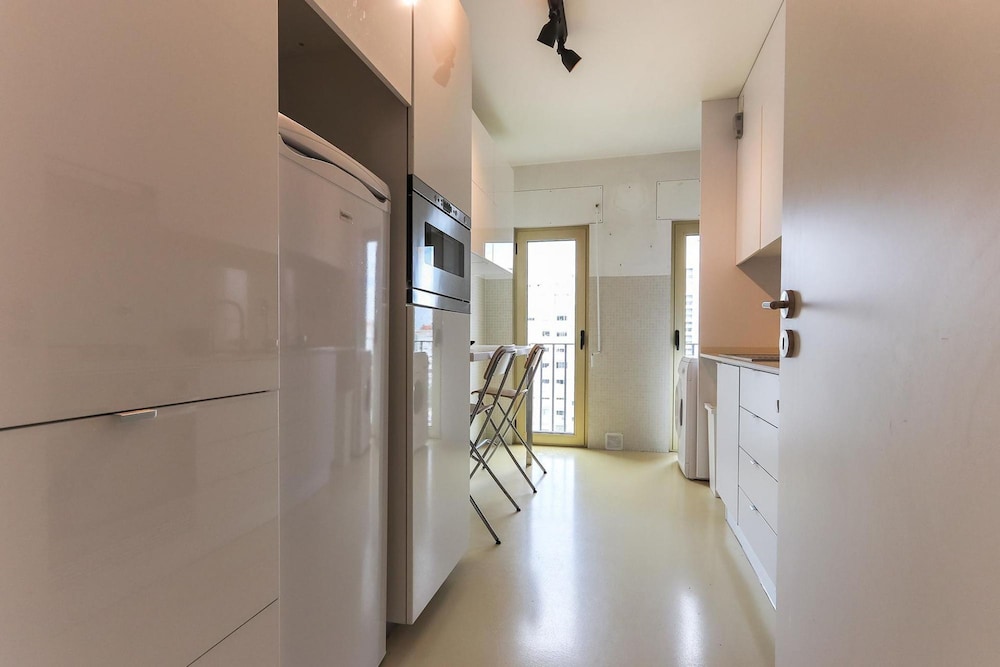 Modern Bright Avenidas Novas by Homing