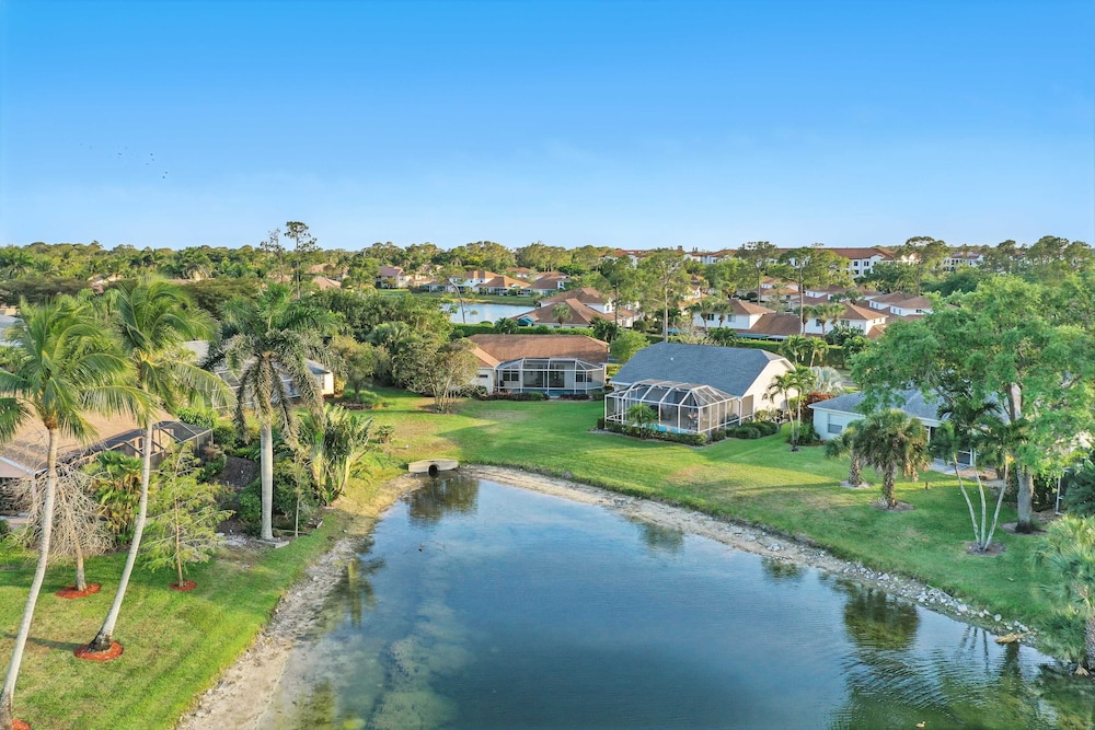 Private Pool, Pond Views, & Bonus Lounge in Gated Naples Community Drive to Dining & Sand