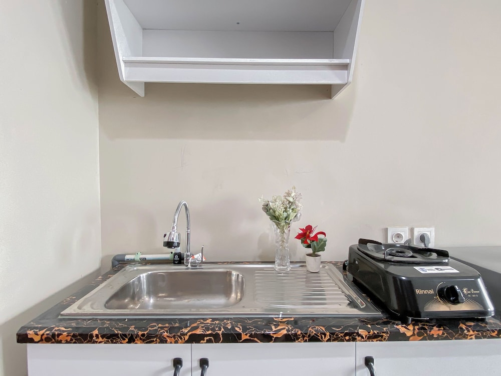 Neutral Minimalist Studio Apartment At Lrt City Sentul - Royal Sentul Park