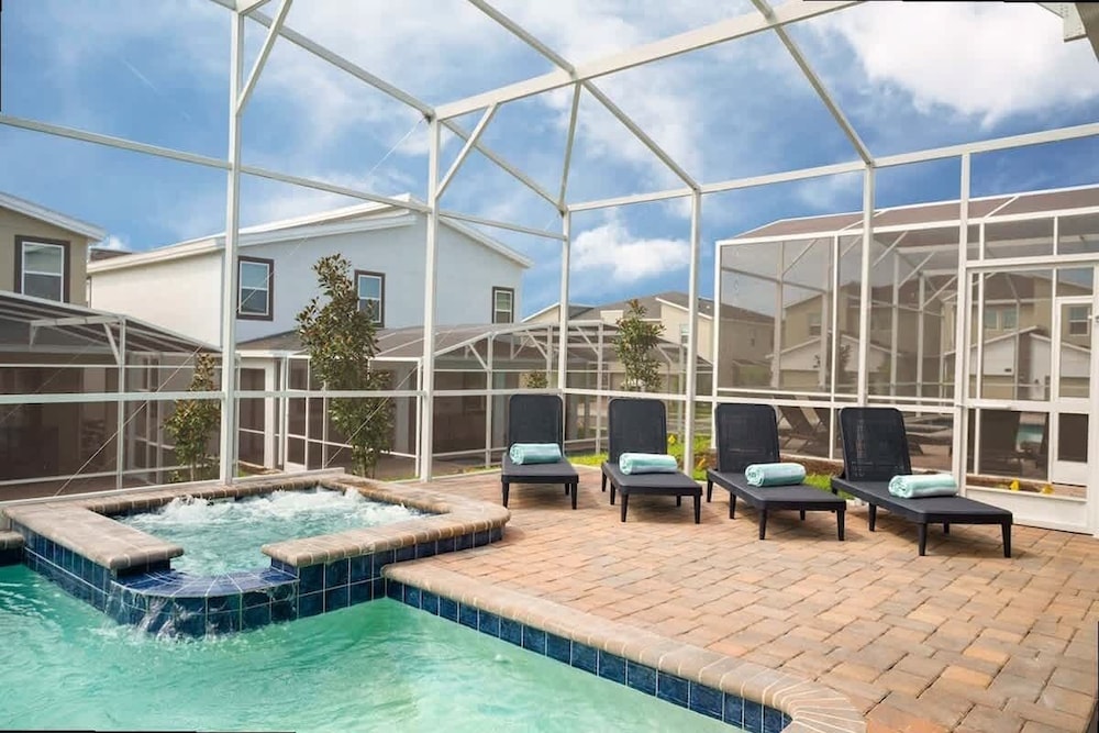 Spacious 7BR w Pool Spa Game Room Near Disney
