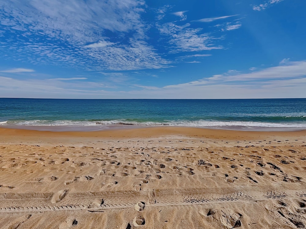Bathing Suit Beach Bungalow by Distinctive Beach Rentals