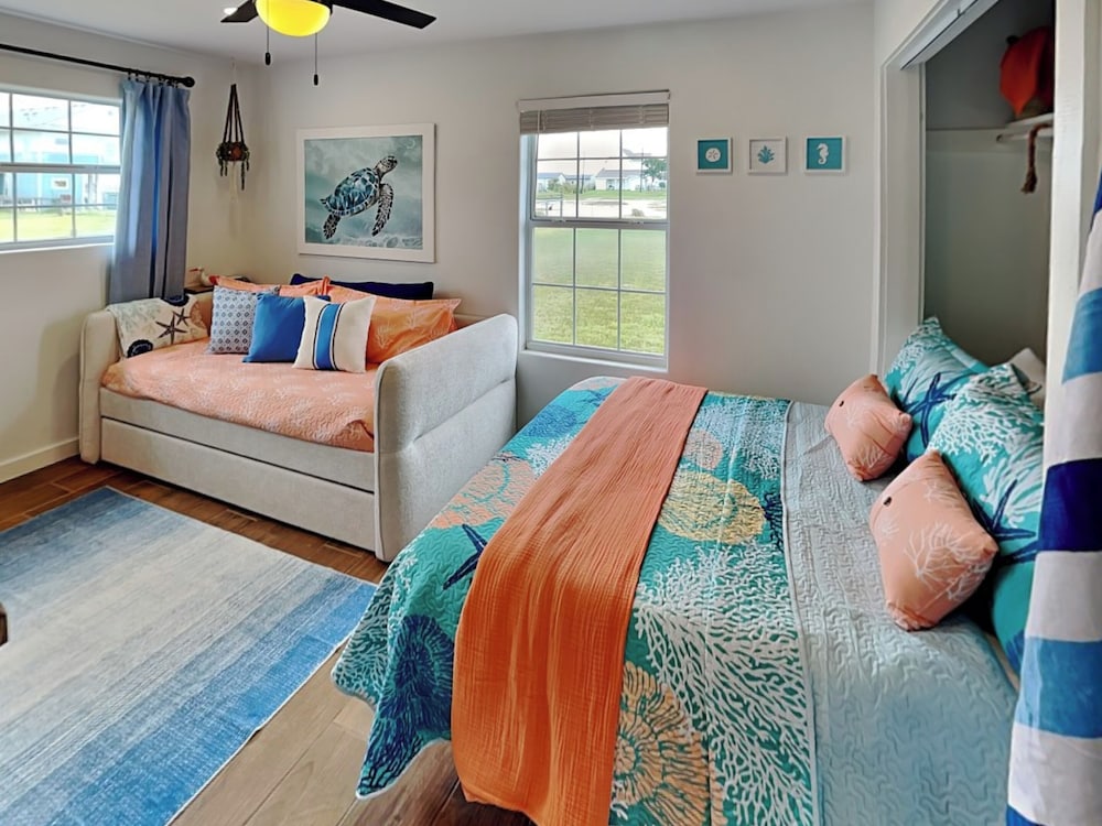 Inn at Dolphin Bay by Miss Kitty’s