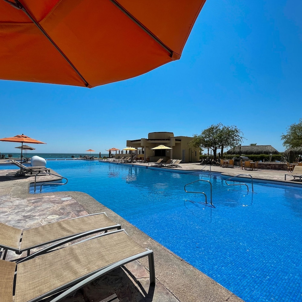 Splash Into Style Ground Floor Poolside Condo