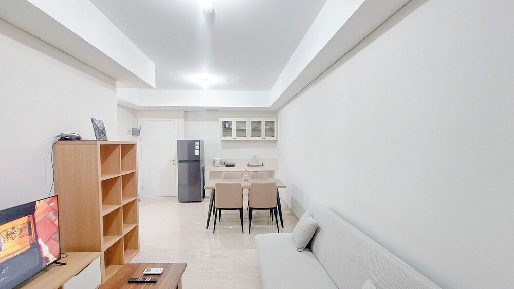 Spacious and Homey 2BR at Podomoro City Deli Medan Apartment