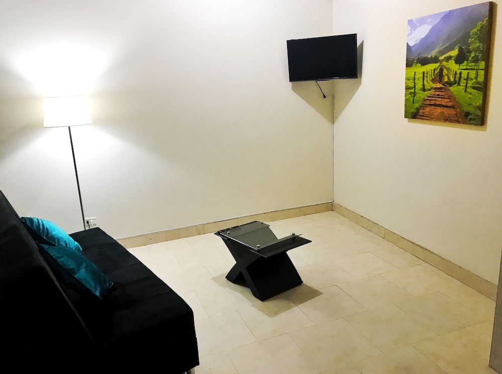 Zona C Apartment by Parceros Group