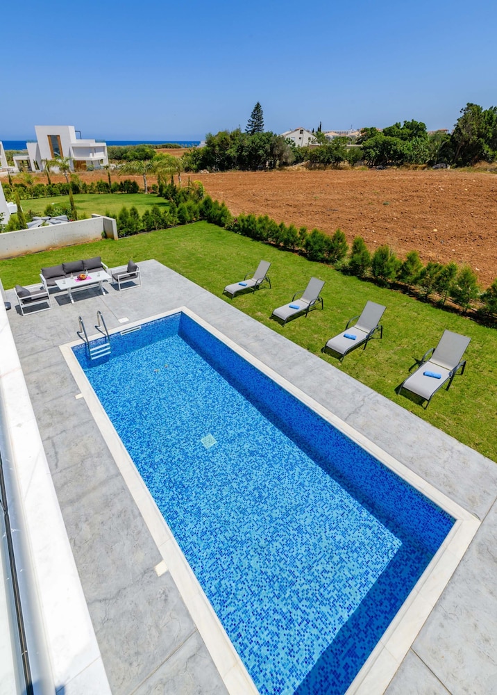 By The Beach - White Coral Villa