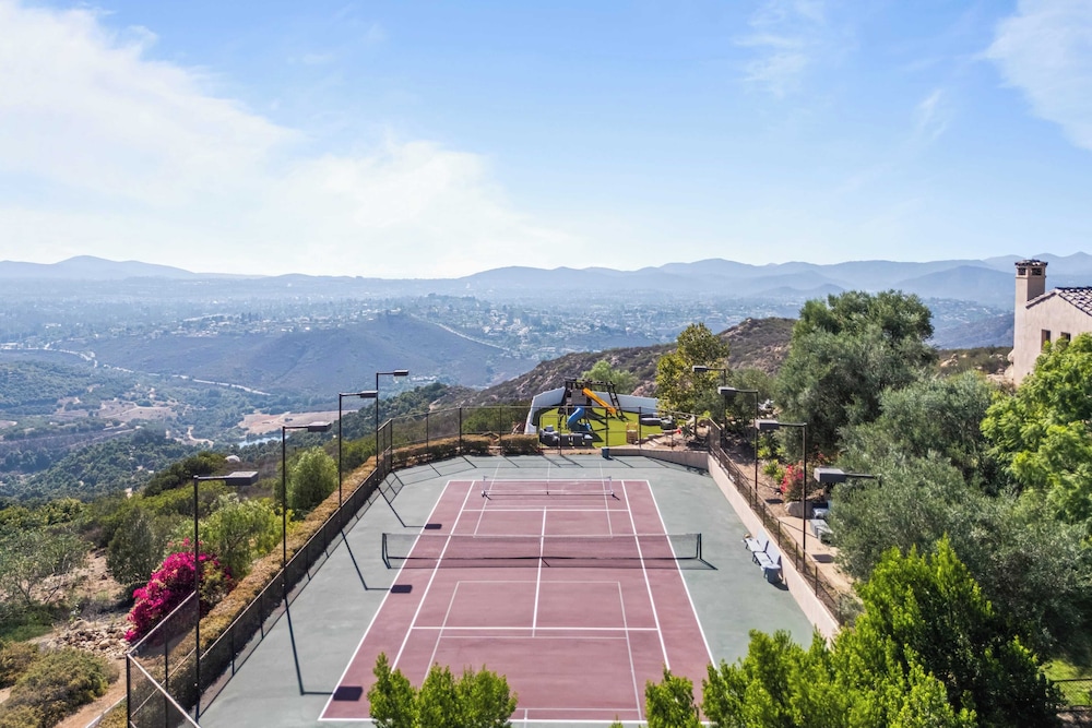 Infinity Pool, Theater, Pickleball + 360 Views Near Lake Poway Sunset Point Estate by Avantstay
