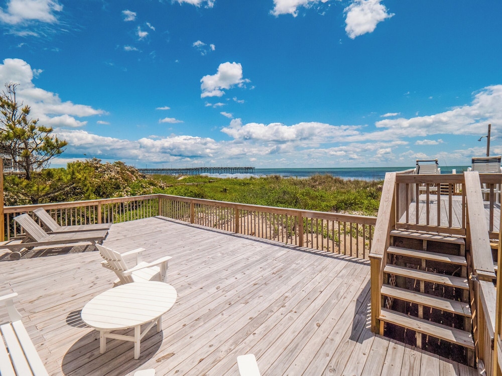 A Charm of Finches by Topsail Realty