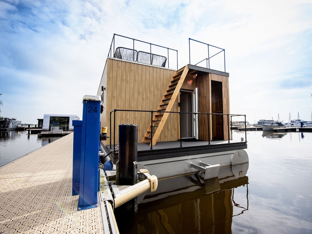Modern Houseboat With View of the Lake