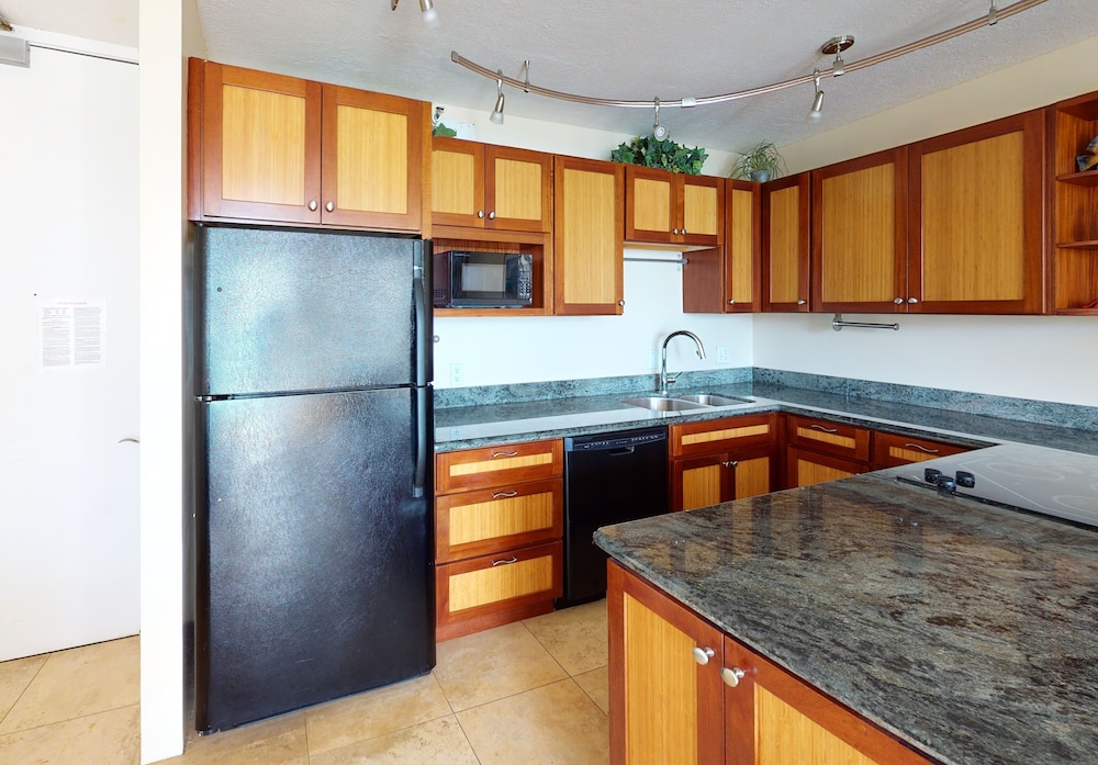 Waikiki Banyan Condo Located One Block From Waikiki Beach! by Koko Resort Vacation Rentals