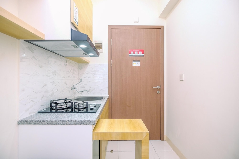 Nice and Warm Studio at Podomoro Golf View Apartment