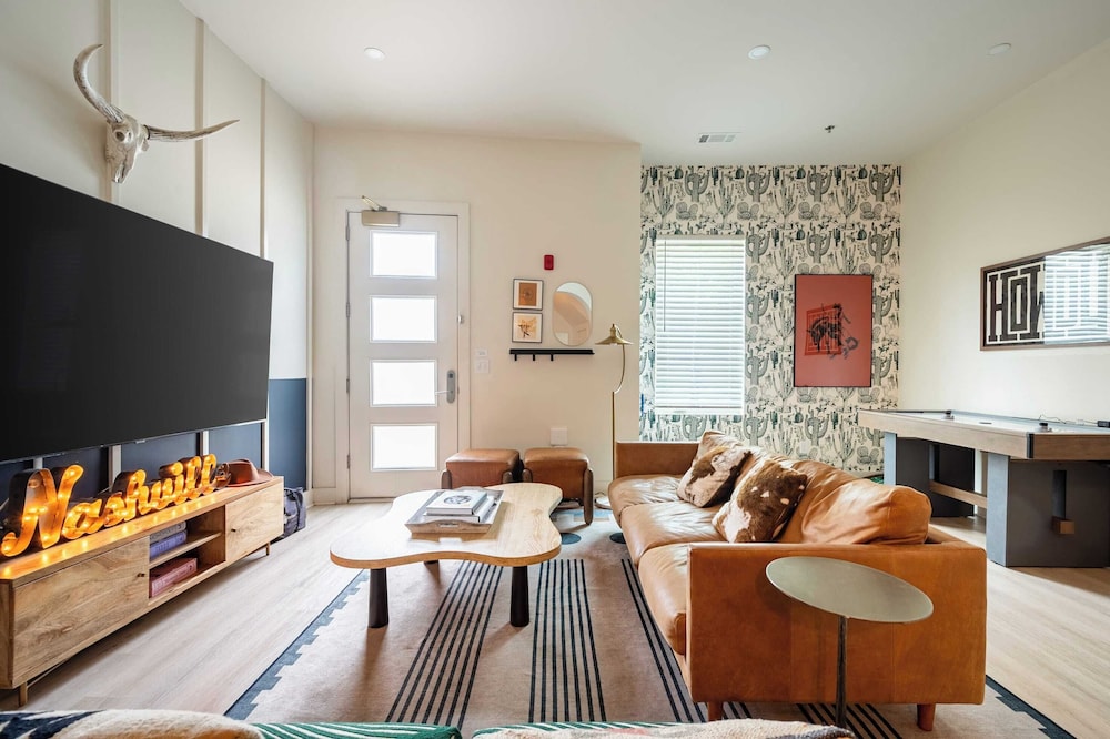 Sleeps 24 Rooftop, Game Room & Outdoor Spaces Just 10 Min to Broadway Outrider by Avantstay