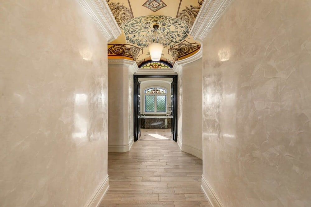 Luxurious 3-story Estate With Gym Pool Slide Private Beach and Lighthouse Views