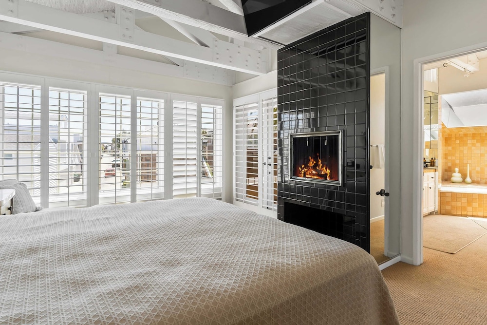 Oceanfront Home Walk to Balboa Pier + Scenic Views Balboa Peninsula Point by Avantstay