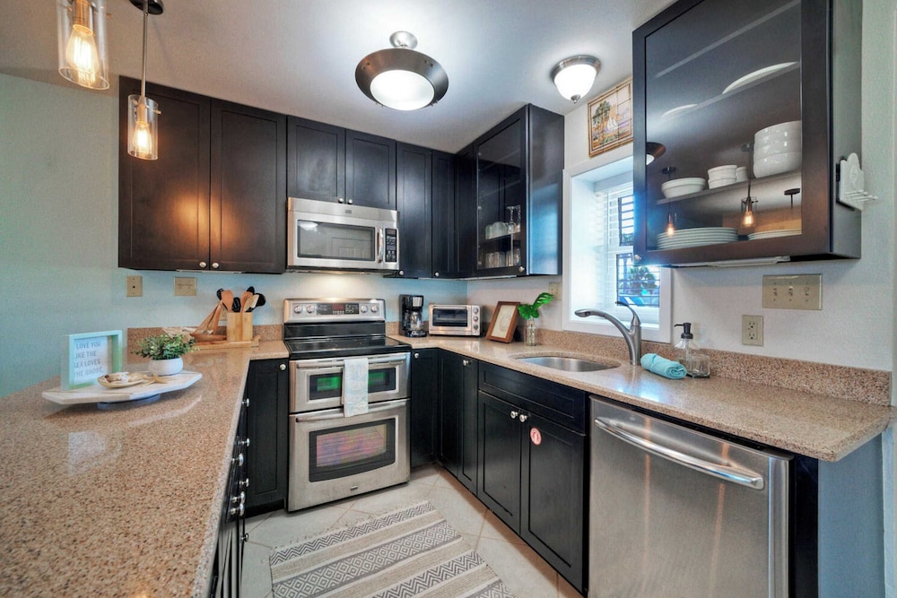 15 Condos, Sleeps 96 w/ Pools & Beach Access Island Retreat by Avantstay