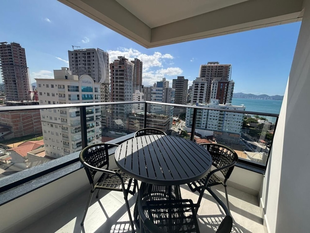 Partial Ocean View Apt w/ Barbecue Grill Axp1301