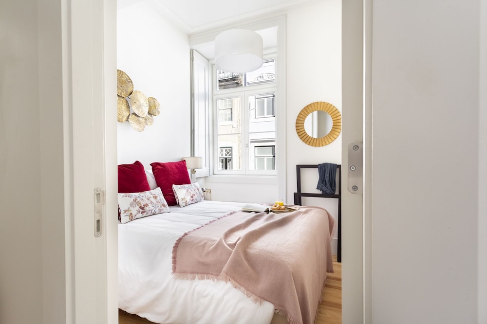 JOIVY 2BR Pastel dreams Apt by the Santa Justa Lift, in Baixa view 3