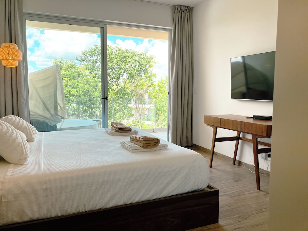 Stylish Playacar Condos w Balcony & Pool