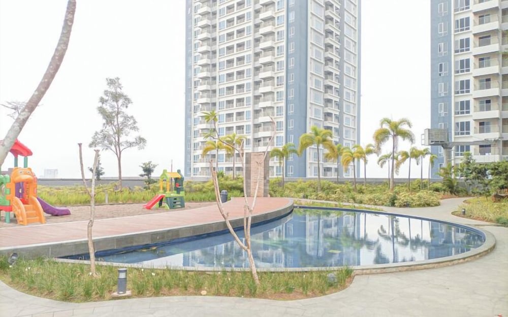 Homey And Compact 2Br Podomoro City Deli Medan Apartment