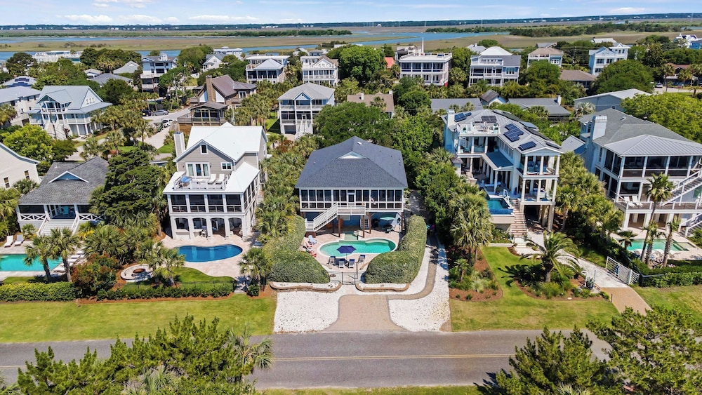 Historic Isle of Palms Retreat Near the Beach w/ Pool & Screened Porch Roosevelt Retreat by Avantstay