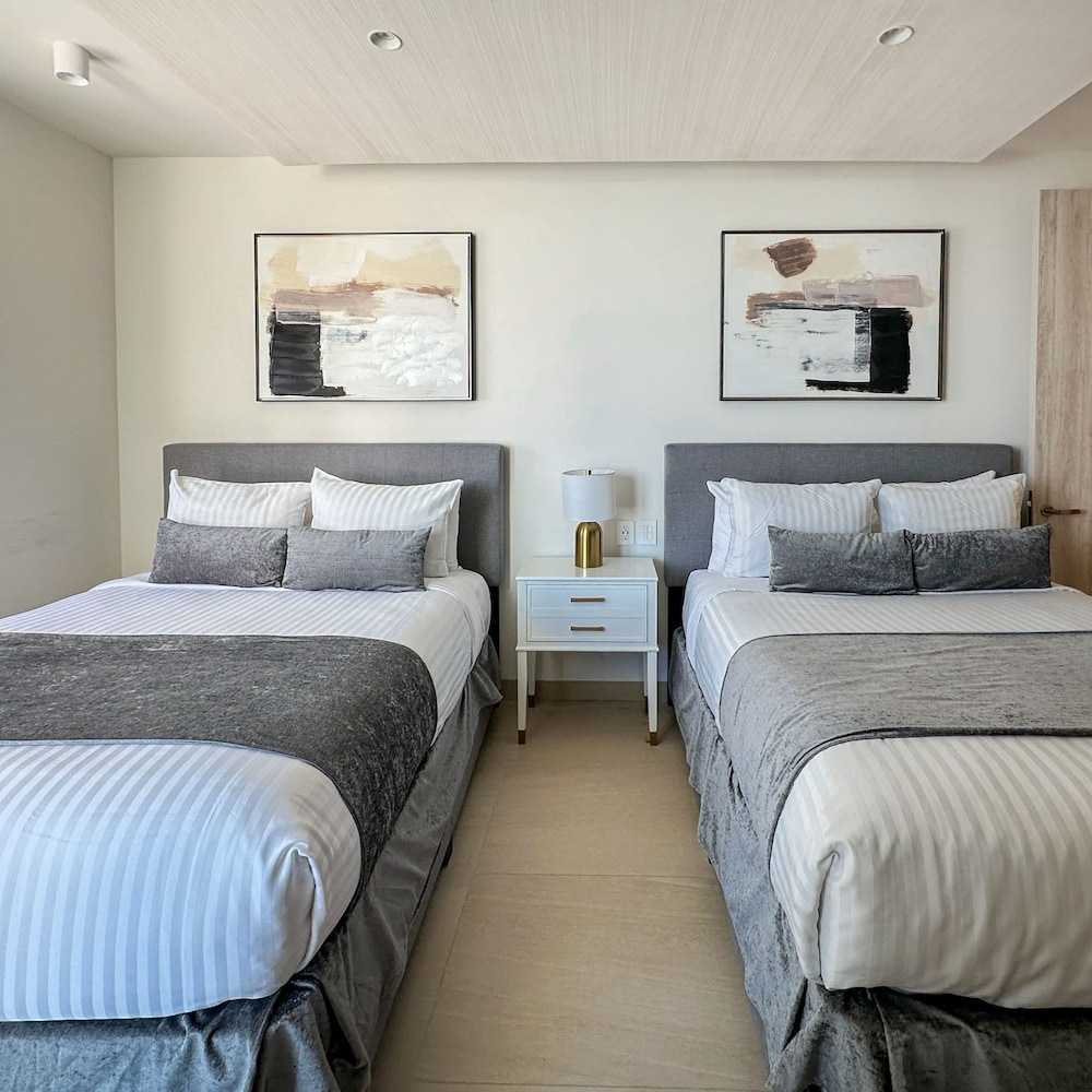 Brand-new Modern 2BR Gem on Iconic Sandy Beach