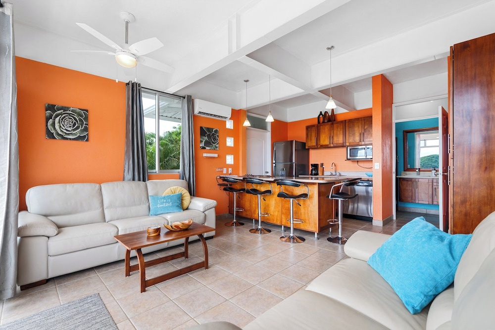 Modern Top-Floor Condo with Panoramic Views and Community Pool