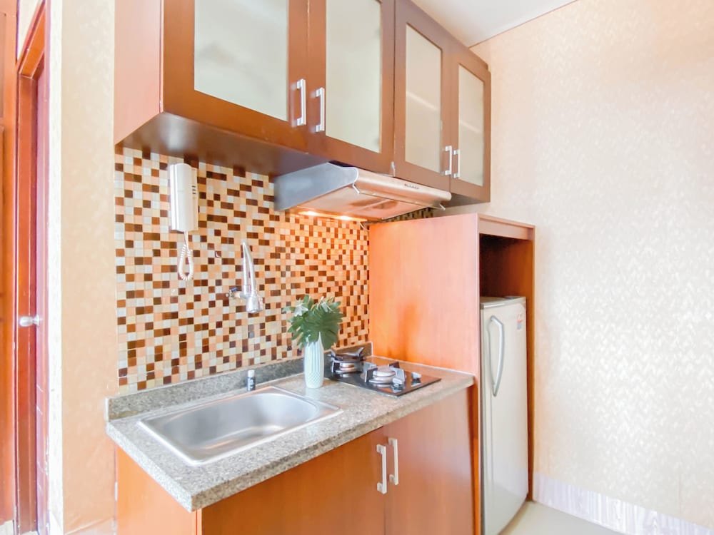 Warm Wood Accents Studio At Mangga Dua Apartment