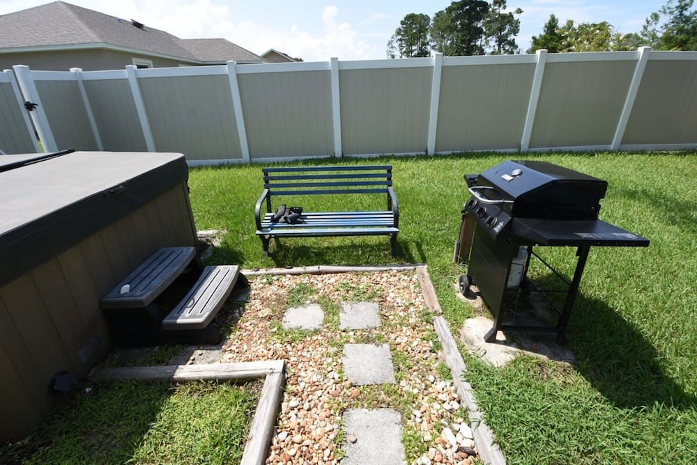 Hidden Oasis Spacious Home With Salt Water Heated Pool Hot Tub Fenced Yard Pets are Welcome