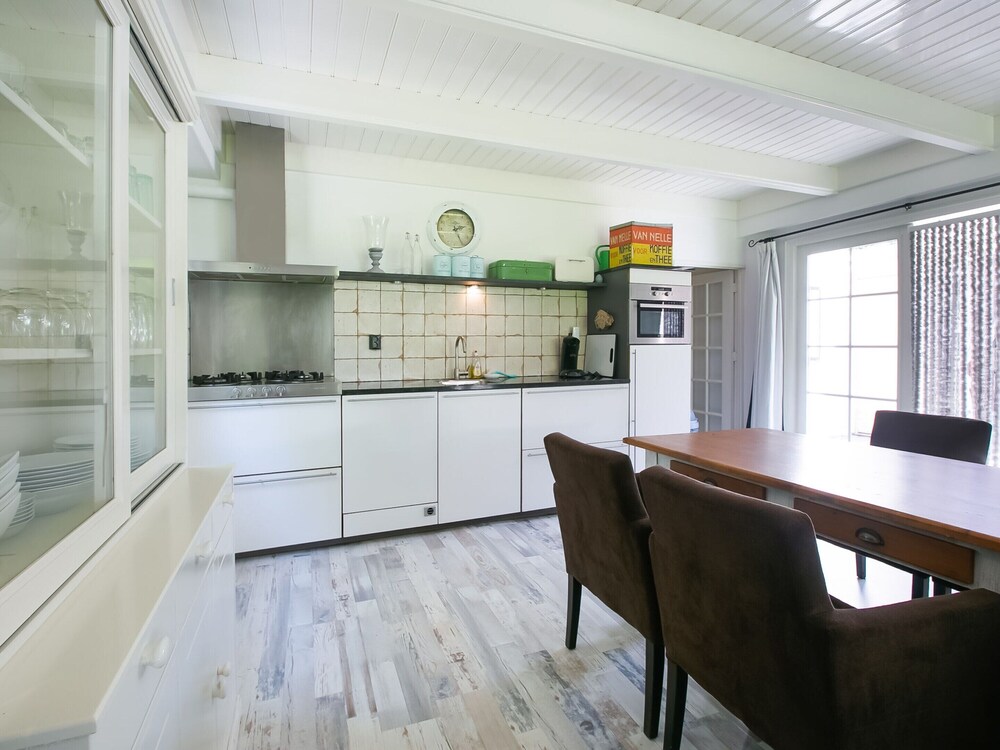 A Detached Bungalow With Outdoor Fireplace, Covered Terrace and Pond in a Forest Plot view 3