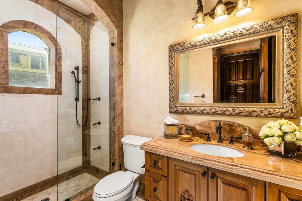 Luxurious 3-story Estate With Gym Pool Slide Private Beach and Lighthouse Views