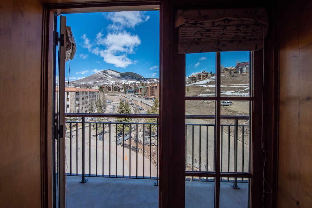 Two Bedroom Condo with Balcony over Mountaineer Square - Just Steps from the Slopes! 2 Condo - No Cleaning Fee! by RedAwning